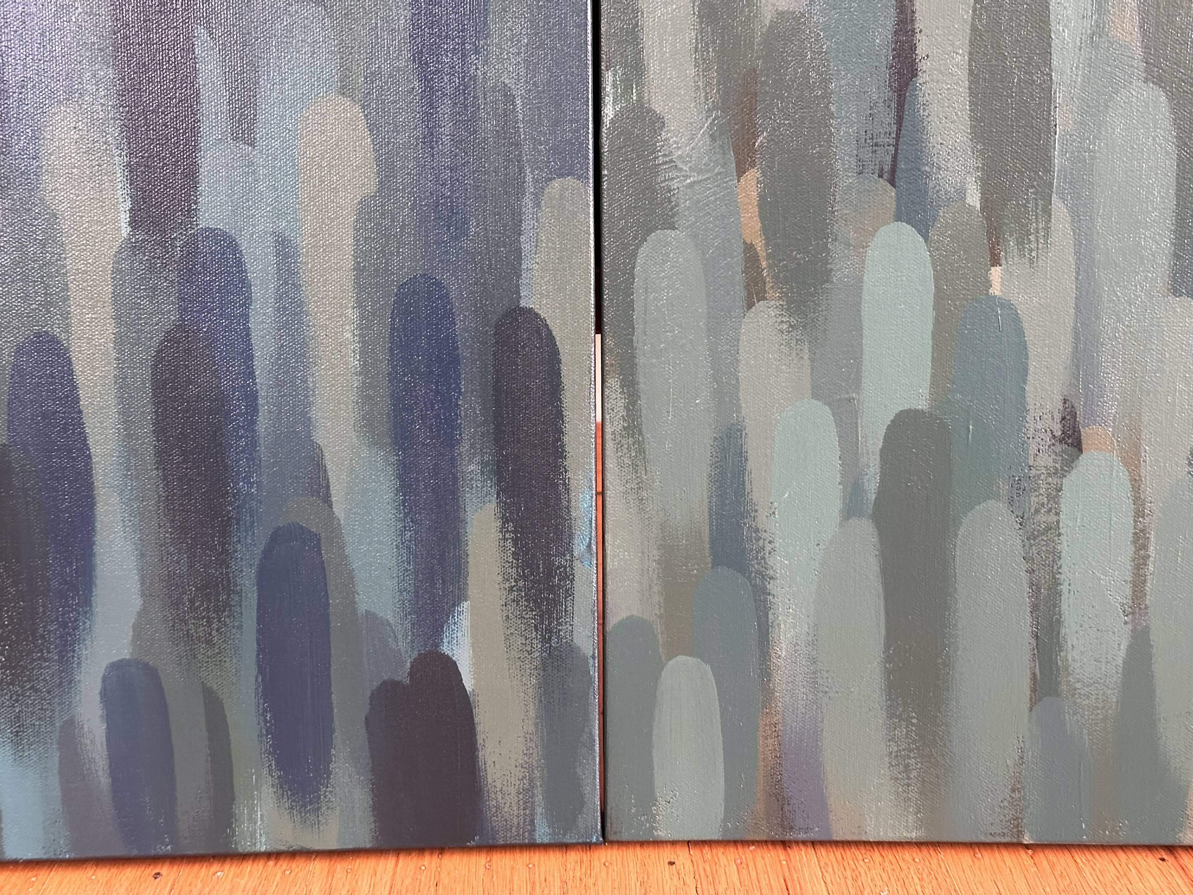 painting in progress in green and blues